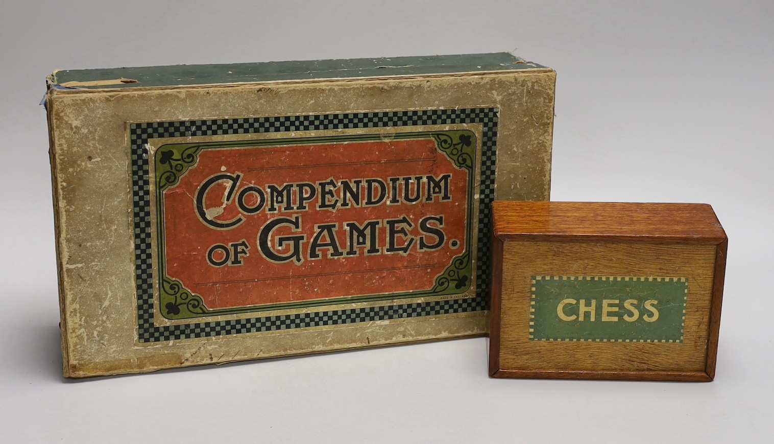 A Staunton pattern boxwood and ebony chess set, kings 7.5cm high and a boxed games compendium